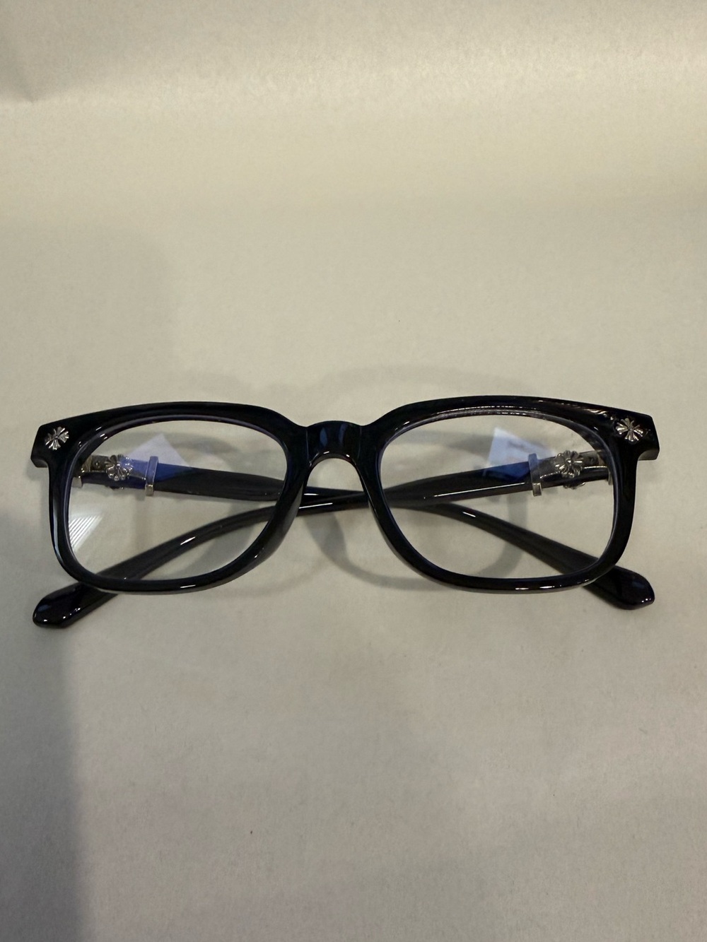 CH Inspired Black Rectangular Eyeglasses with Silver Eclipse Accent.